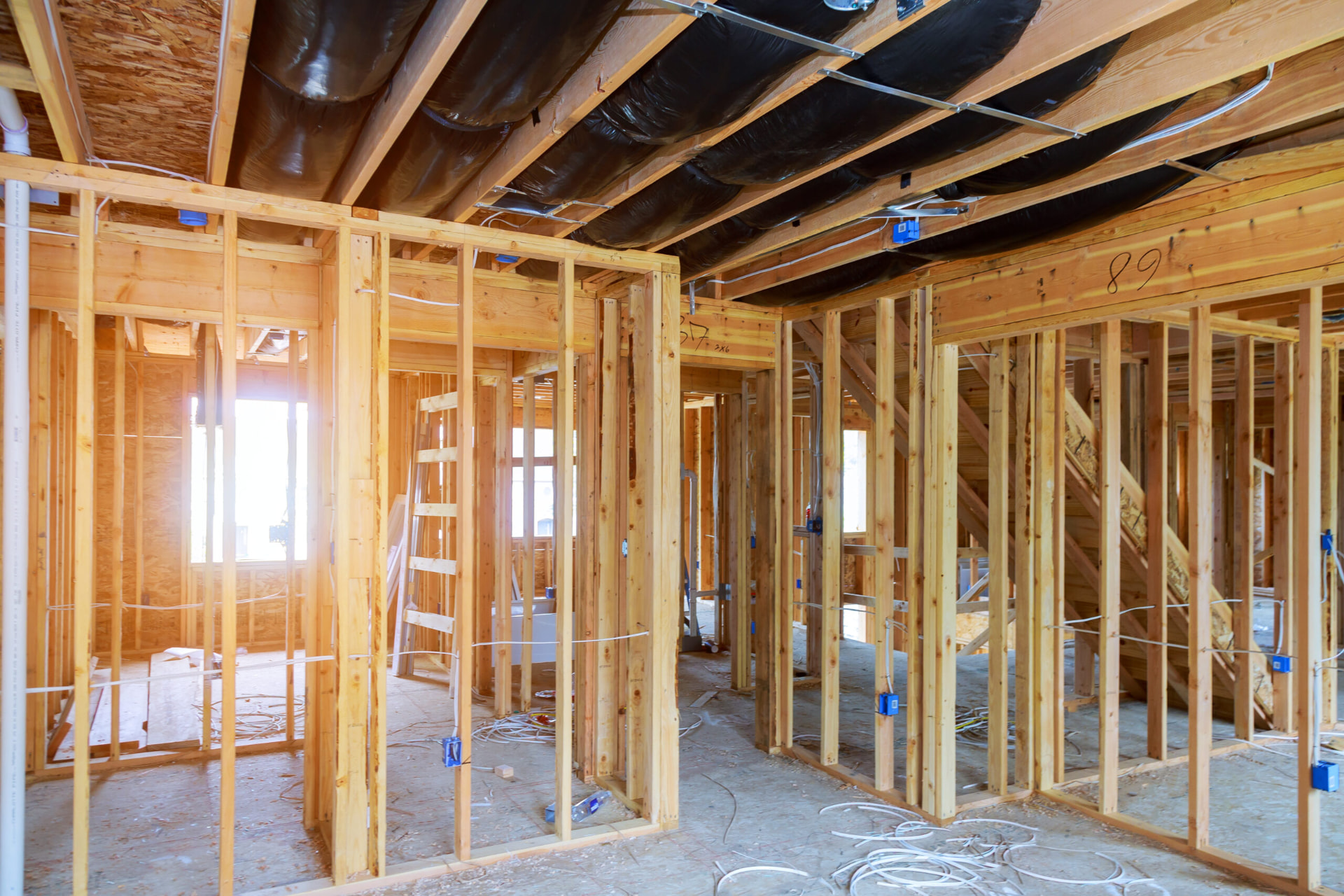 Timber frame interior of a new build home during first fix in Wolverhampton