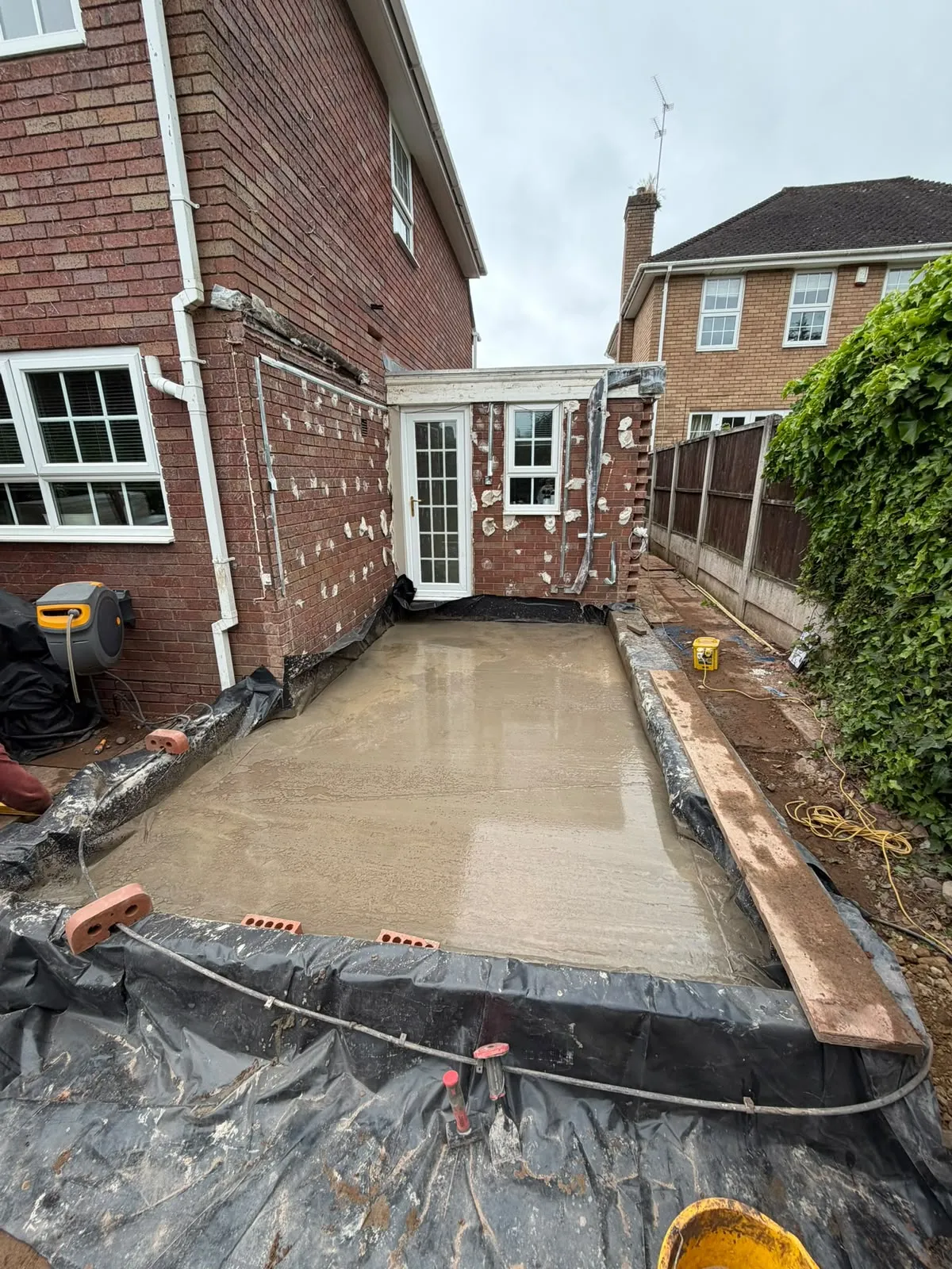 Concrete slab poured on the old conservatory footprint