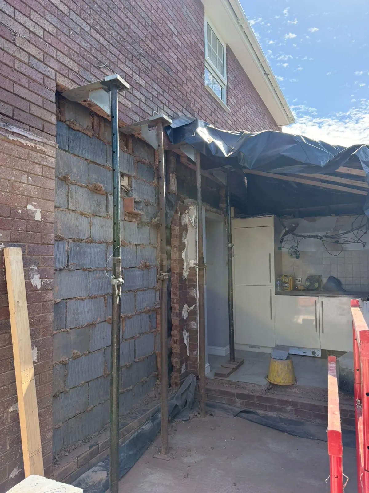 Blockwork wall and the opening through into the house