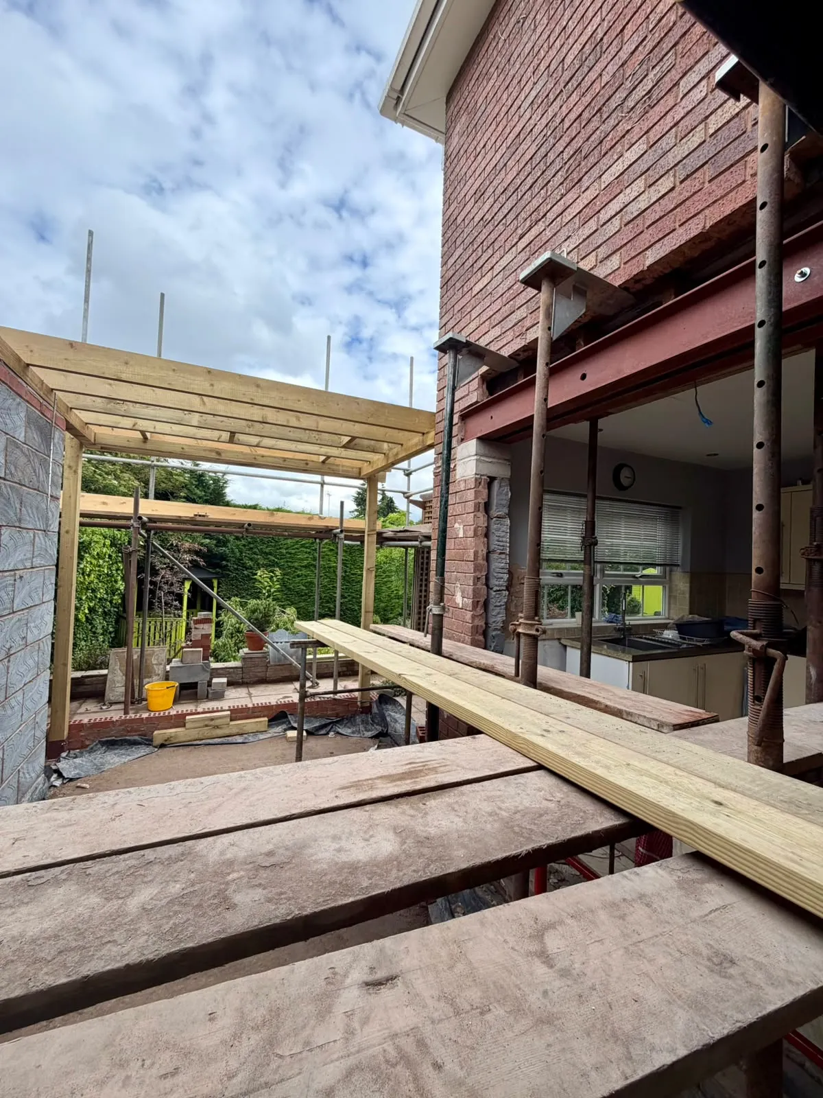 Steel and timber in place over the full-width opening