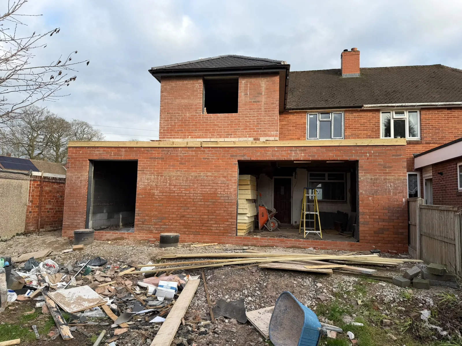 The wrap-around extension seen from the garden near completion