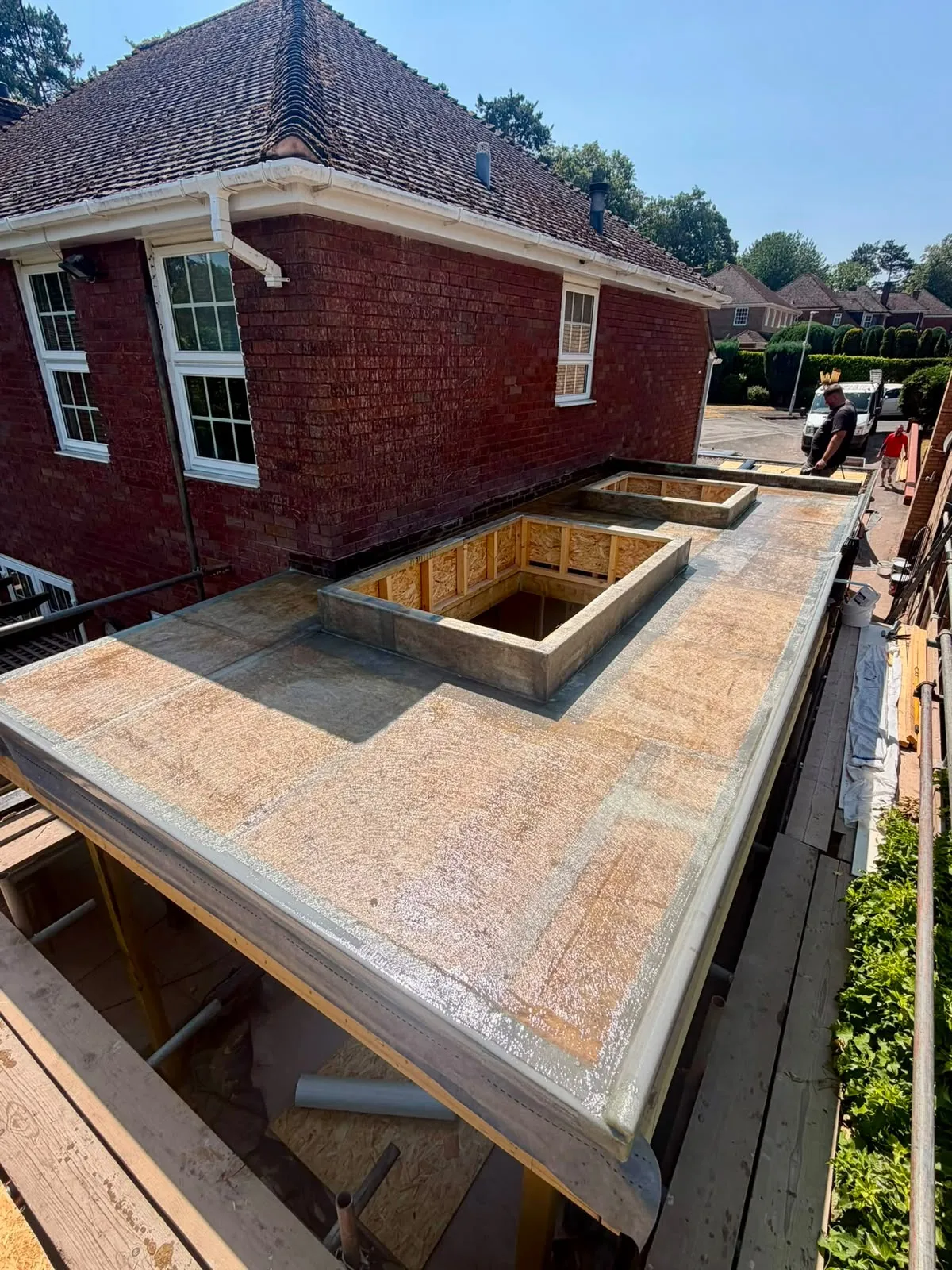 Completed roof deck with upstands for the two skylights