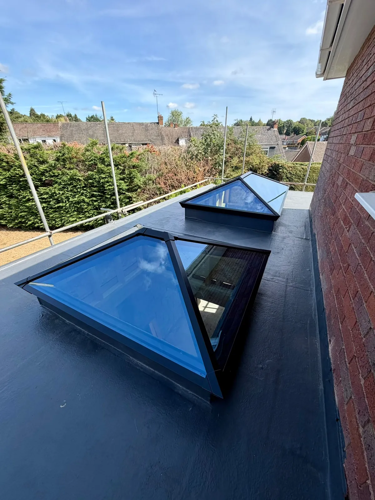 Two glazed pyramid rooflights on the finished orangery roof