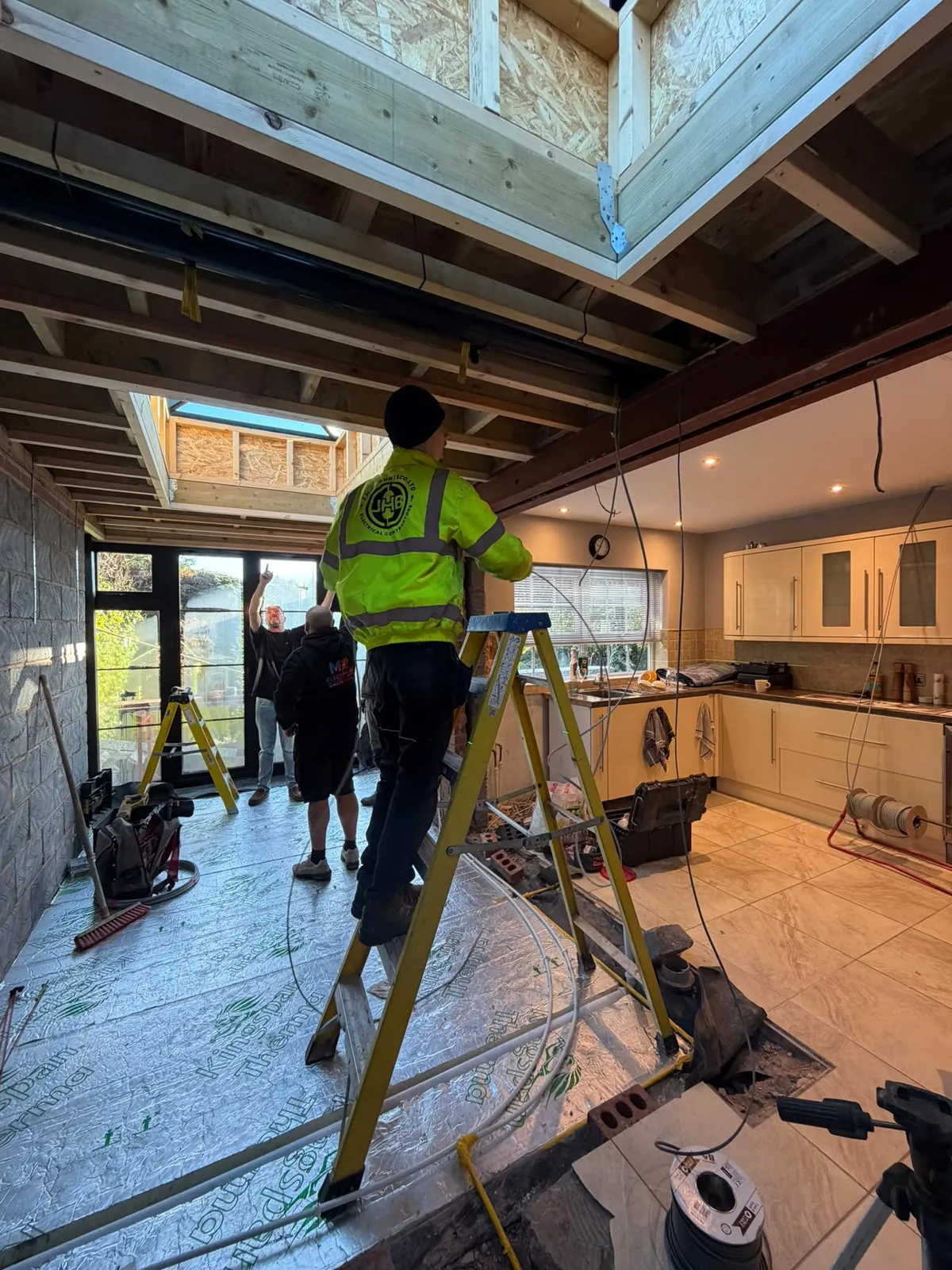 Inside the new room during first fix, under the rooflight openings